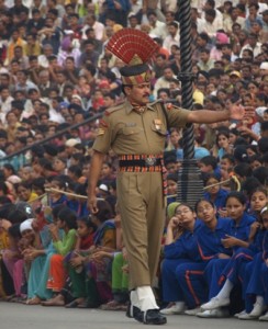 Picture of an Indian Ranger with the massed ranks of the Indian supporters for the ceremony.