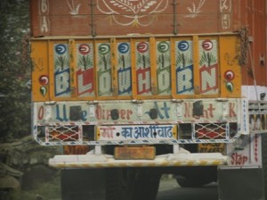 Picture of the thing we came to loath the most - Indian wagons with their Blow Horn signs painted on the rear.