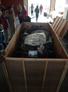 Picture of Bertha in a box of bits at Kathmandu customs house.