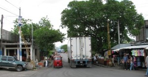 Picture of the road leading back towards the bridge to Honduras.