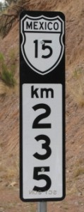 Picture showing a Mexico-15 (235km) sign.