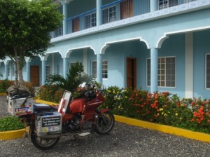 Picture of the lovely light blue painted apartments with Bertha parked outside just before we set off again.